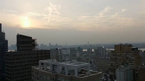 Panoramic View over Manhattan from Skyscraper Rooftop during sunset Stock Footage 92578276