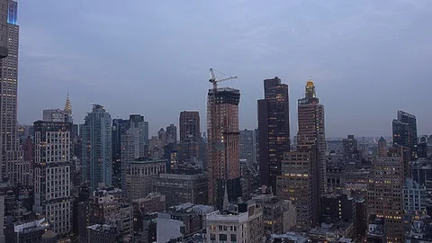 Panoramic View over Manhattan from Skyscraper Rooftop during dawn Stock Footage 92578660