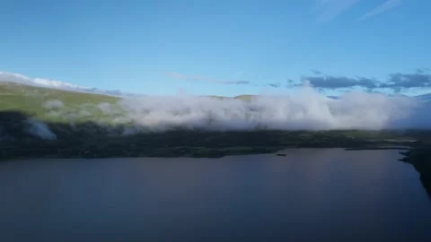 Panoramic View Over Skarvatnet Lake in Oppdal, Norway surrounded by mountains 動画素材 276169367