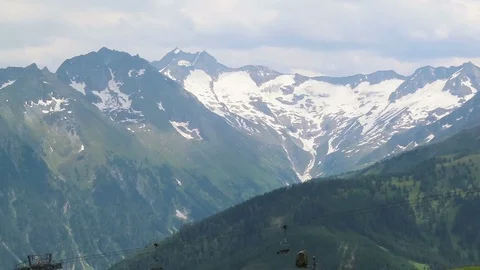 Panoramic view over snowy mountains of Zillertal valley in Tirol Austria. Video stock 112934681