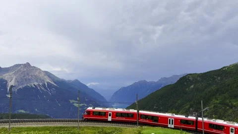 Panoramic View over the Swiss Alps and Valley and Bernina Express Train Stockbeeldmateriaal 292980680