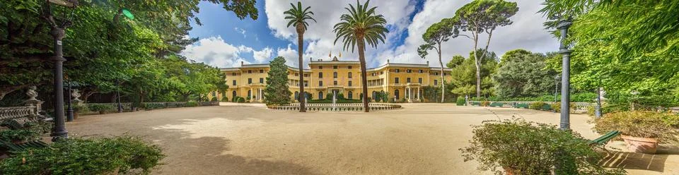 Panoramic view over a well-kept park in Barcelona at noon time in sunlight Stock Photos