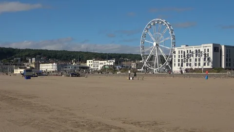 Panoramic view over Weston-super-Mare attractions including Grand Pier Stock Footage 111575997