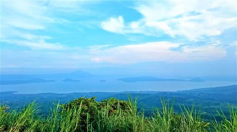 A panoramic view overlooking a lake Stock Photos