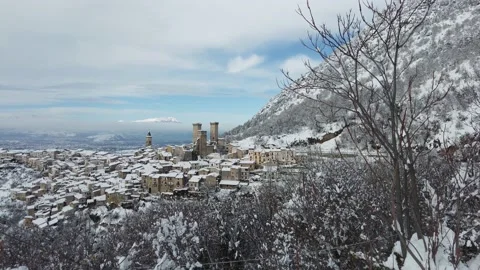 Panoramic view of Pacentro covered in snow during winter season. Abruzzo, Italy. Stock Footage 232327011
