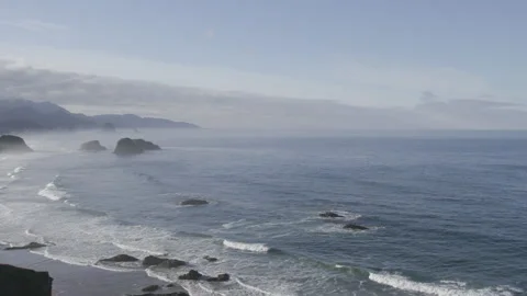 Panoramic view of the Pacific Ocean from cliffside at Canon Beach Stock Footage 332255304