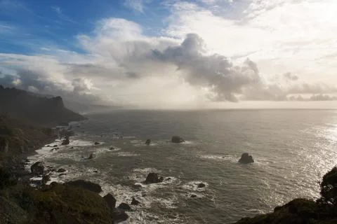 A panoramic view of the Pacific Ocean stretching to the horizon Stock Photos