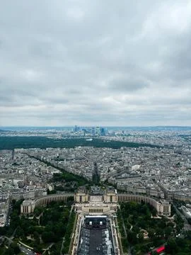 Panoramic view of Paris cityscape under cloudy sky from above 库存照片