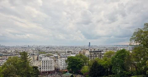 Panoramic view of paris skyline with cloudy sky from montmartre 写真素材