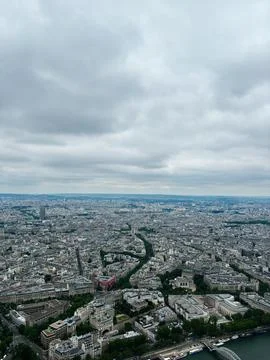 Panoramic view of Paris skyline under cloudy sky Stock Photos