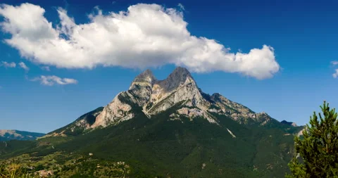 Panoramic view of "Pedraforca" Massif with fast movement of clouds.Time lapse Stock Footage 118601438