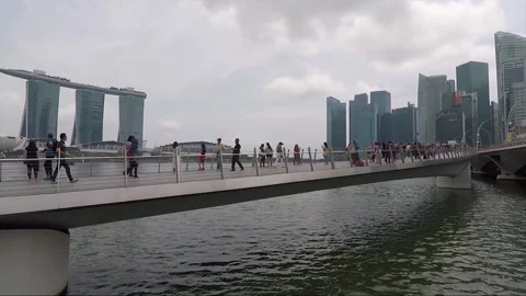 Panoramic View, People on Jubilee Bridge, Downtown, Marina Bay, Singapore Stock Footage 334339874
