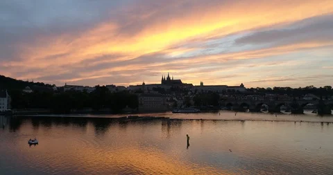 Panoramic view on Prague castle and Charles bridge during sunset Stock Footage