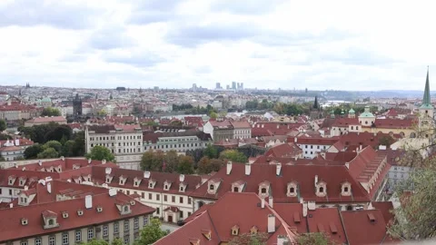 Panoramic view of Prague cityscape with red tiled rooftops historic towers and m Stock Footage 318869485
