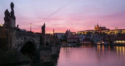 Panoramic view of Prague town, Vltava river and Vitus Cathedral at late evening Stock-Footage 148010770