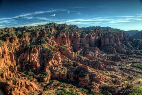 Panoramic view of red cliffs of sandstone in Sierra de las Quijadas National Stock Photos
