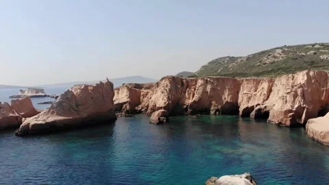 Panoramic View of Red Coastal Cliffs and Azure Sea Stock Footage 309283961
