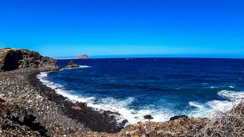 Panoramic view on the Red Mountain (La Montana Roja) from Santa Barbara Gol.. Stock Photos