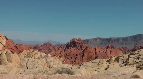 Panoramic view on red yellow wavy rocks of Valley of Fire State park, NE Stockbeeldmateriaal 60022281