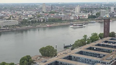 Panoramic view of the Rhine river, riverbank, and cityscape in COLOGNE Stock Footage 345096248