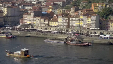 Panoramic view of the Ribeira waterfront with boats on the river. Stock Footage 327624854