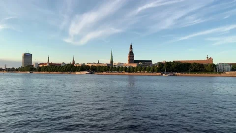 Panoramic view of Riga city skyline from moving boat. Riga, Latvia Stock Footage 221370358