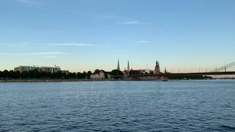 Panoramic view of Riga city skyline and waterfront from moving boat.  Riga Stock Footage 221370401