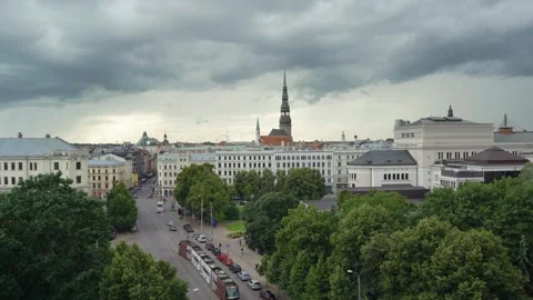 Panoramic view of Riga Old Town skyline with St. Peter Church spire and street Stock Footage 341850745