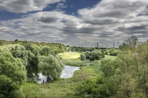 Panoramic view of the river and the old power plant. Stock Photos