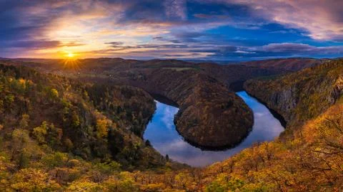 Panoramic view of river canyon with dark water and autumn colorful forest. Ho Stock Photos