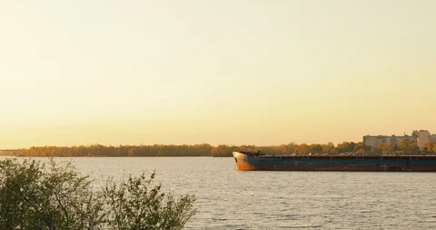 Panoramic view on river port with fleet barges anchored in water next to river Stock Footage 129116613