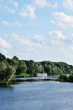 Panoramic view of the river. River and pleasure ship. Stock Photos