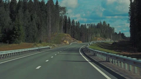 Panoramic view of the road from the window of a moving car. Kola highway through Stock Footage 143294319