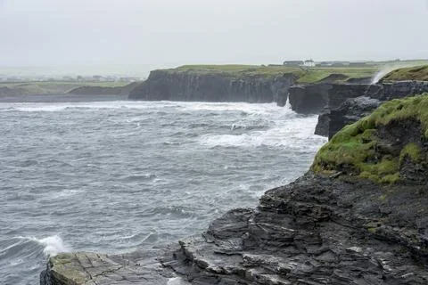 A panoramic view of the rocky cliffs of Mohor in Ireland. Stock Photos