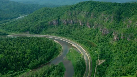 Panoramic view of rocky mountain, river and railroad. 스톡 동영상 111278637