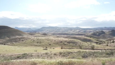 Panoramic view of rolling Painted Hills and sagebrush in Oregon Stock Footage 346794727