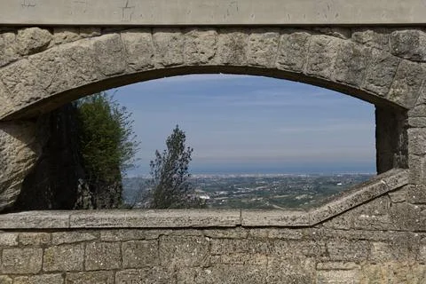 Panoramic view of Romagna coast from a window in a stone wall Stock Photos