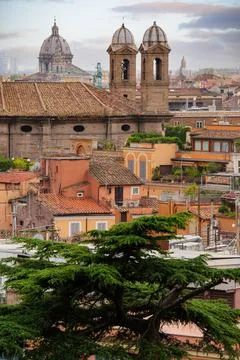 Panoramic view to Rome rooftops with catholic basilics and monuments, Italy Stock Photos