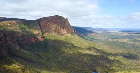 A panoramic view of a rugged mountain range. Stock Photos