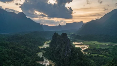 Panoramic view of rural landscape with rice fields and mountain at sunset Stock Footage 112167246