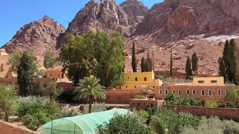 Panoramic view of Saint Catherine monastery farm with mountains backdrop Stock Footage 341451949