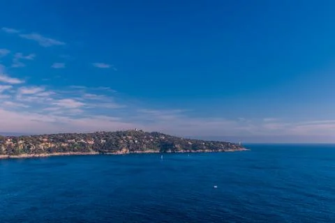 The panoramic view of Saint-Jean-Cap-Ferrat and the Mediterranean Sea's turqu Stock Photos