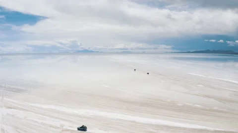 Panoramic view Salar De Uyuni reflection water salt lake, desert in Bolivia 4K Stock Footage 198316379