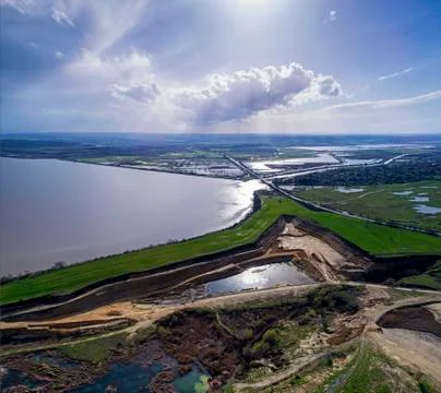 Panoramic view of sand quarry, mining of yellow construction sand, pumping sand  Stock Photos