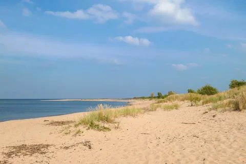 A panoramic view on the sandy beach by Baltic Sea on Sobieszewo island, Pol.. Stock Photos