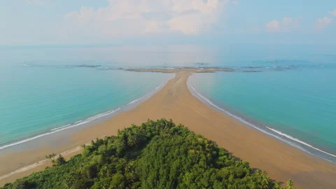 Panoramic view of sandy Whale Tail formation at low tide at Marino Ballena Stock-Footage 341347317
