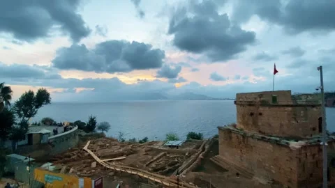 Panoramic view of the sea against the backdrop of mountains in the clouds Stock Footage 261759072