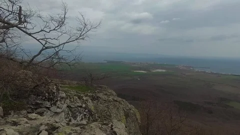 Panoramic View to the Sea, Over Large Green Fields Motion Stock-Footage 106348191