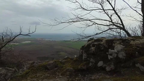 Panoramic View to the Sea, Over Large Green Fields Motion Stock Footage 106348207