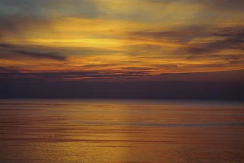 Panoramic view of seascape sunset with lingering rays of the sun at the Atlantic Stock Photos